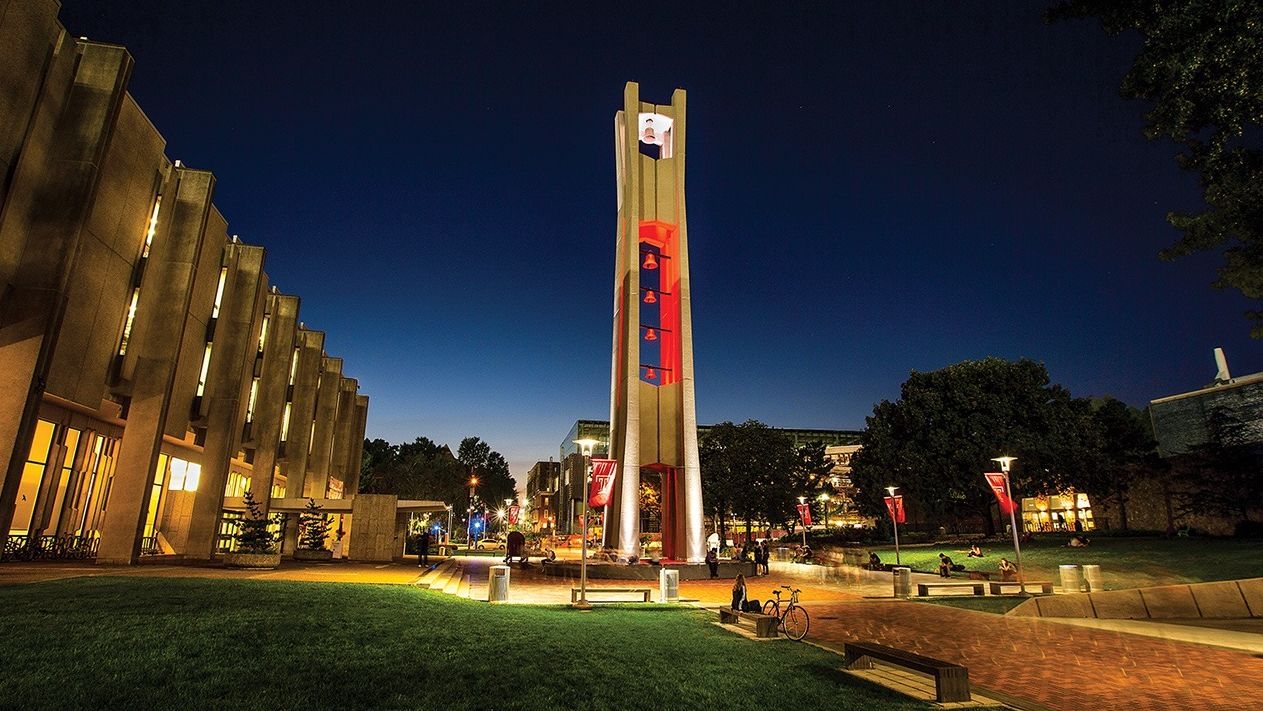 Temple University's Bell Tower lit red at dusk on Main Campus in Philadelphia